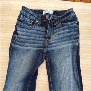 Buckle Blue Skinny Jeans with Distressed Look